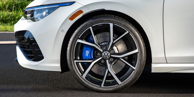 Close up view of Golf R 19” wheel and front brake caliper.