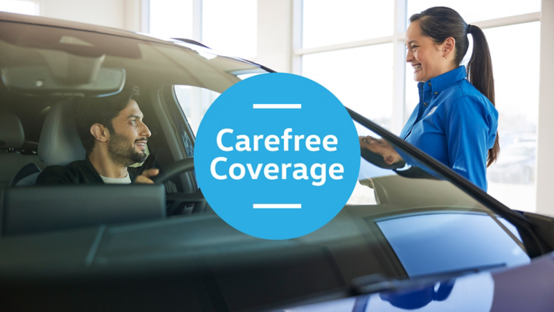 A blue circular logo depicts the Carefree Coverage program. With a woman and man in the background.