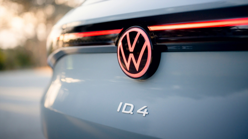 Close-up of the illuminated logo on the back of a Arctic Blue Metallic ID.4