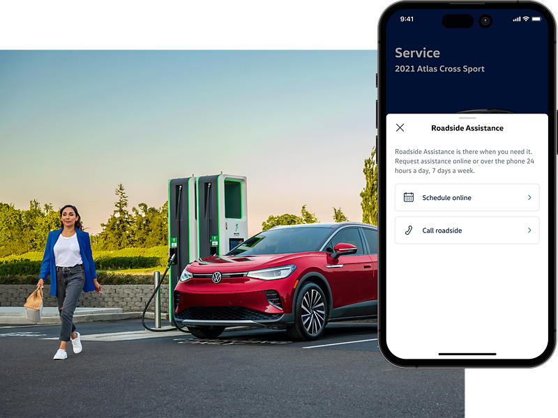 Woman walking away from an ID.4 SUV shown in Aurora Red Metallic plugged into a public charging station. The MyVW app is displayed on a superimposed mobile phone.