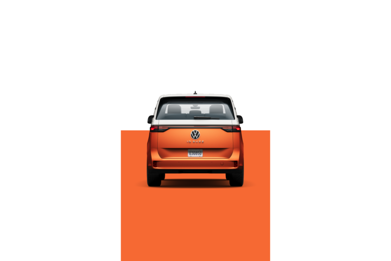 A back view of the ID. Buzz in Energetic Orange in front of a two-tone white and orange background.