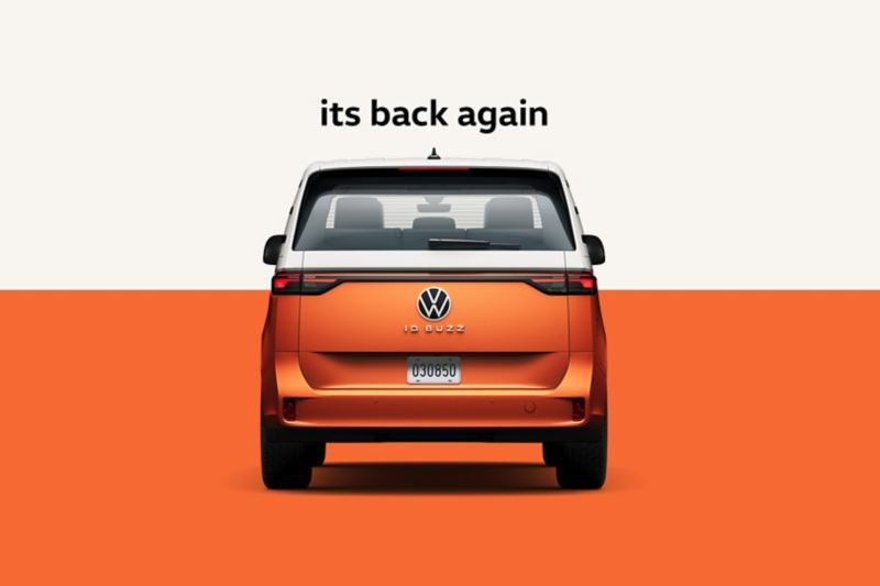 ID. Buzz coming to Findlay Volkswagen Henderson - Its back again Energetic Orange Metallic in front of a two-tone white and orange background. The words “Its back again” are displayed above the vehicle.