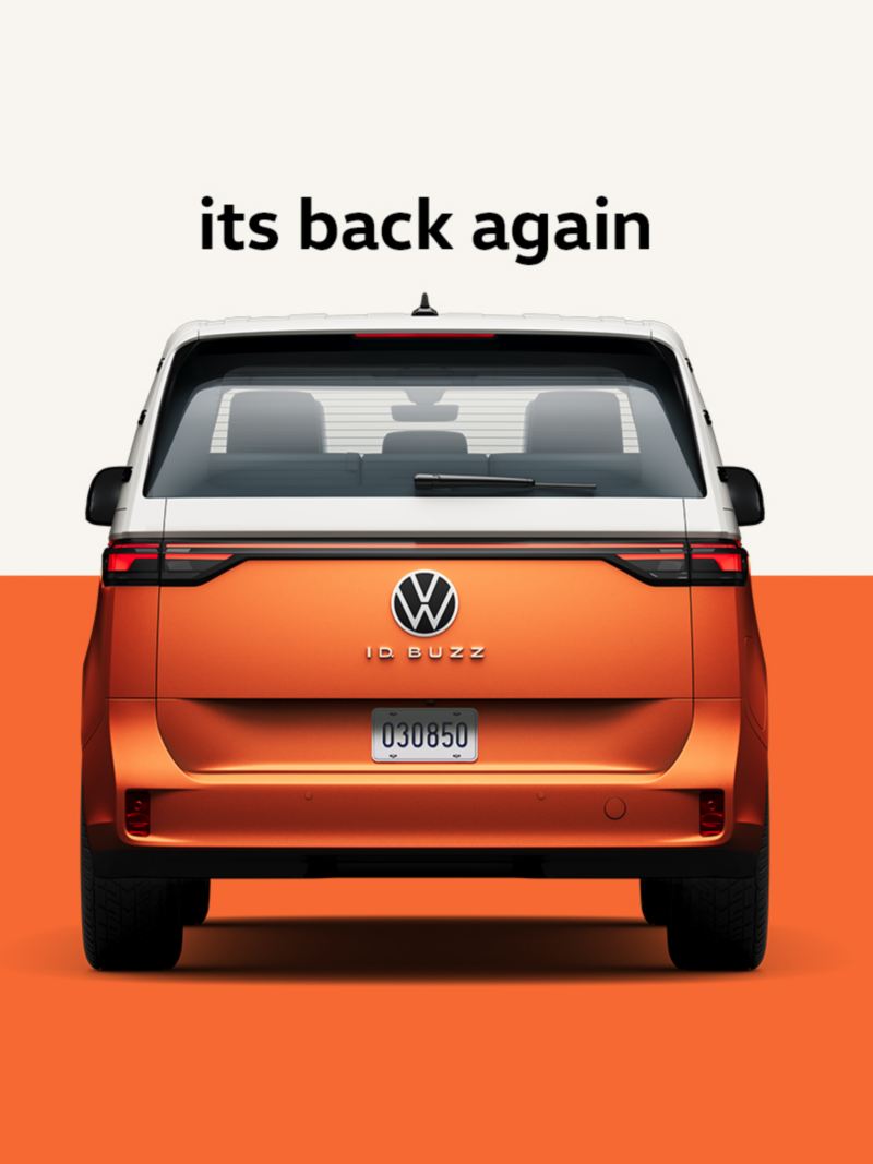 An image showing a rear view of the ID. Buzz in Energetic Orange Metallic in front of a two-tone white and orange background. The words “Its back again” are displayed above the vehicle.
