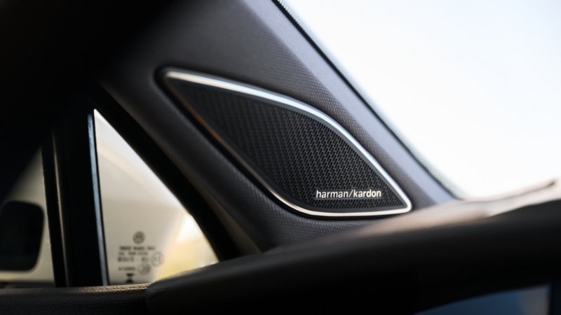 Close up view of the available Harman Kardon a-pillar badge in a Tiguan.