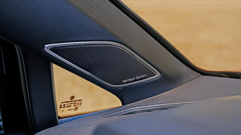Speaker integrated into the A-pillar of a Mythos Black Metallic Golf R.