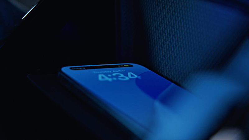 Close up of a mobile device in the wireless charging station of the Golf R panel