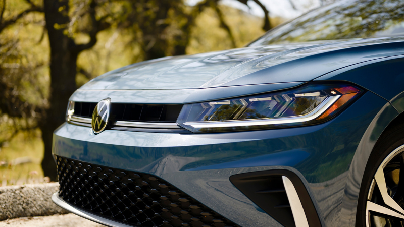 Close up view of a Jetta LED headlight with LED DRL illuminated