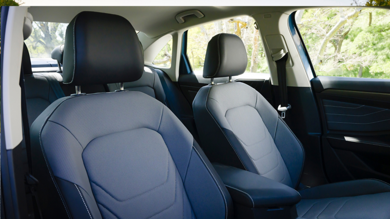 The front seats in a Jetta from the front passenger’s perspective