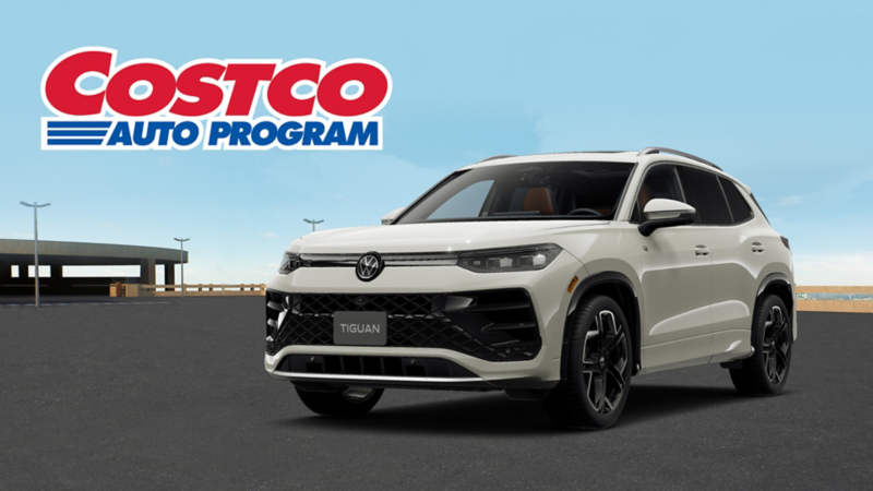 Front view of a 2026 Tiguan shown in Sandstone parked on an empty lot with a Costco Auto Program graphic placed in the top left hand corner.