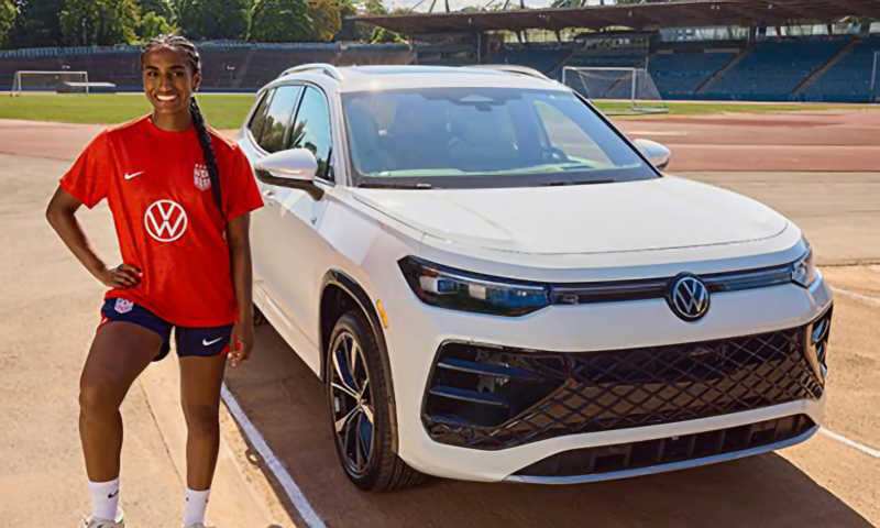Soccer player in front of the Tiguan