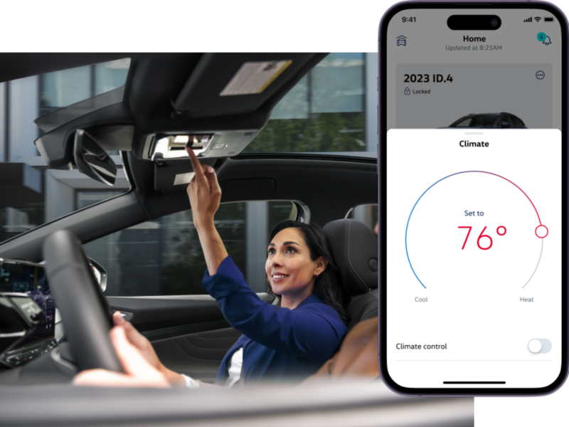 Interior vehicle shot of the front passenger interacting with the overhead controls. The myVW app is displayed on a superimposed mobile phone.