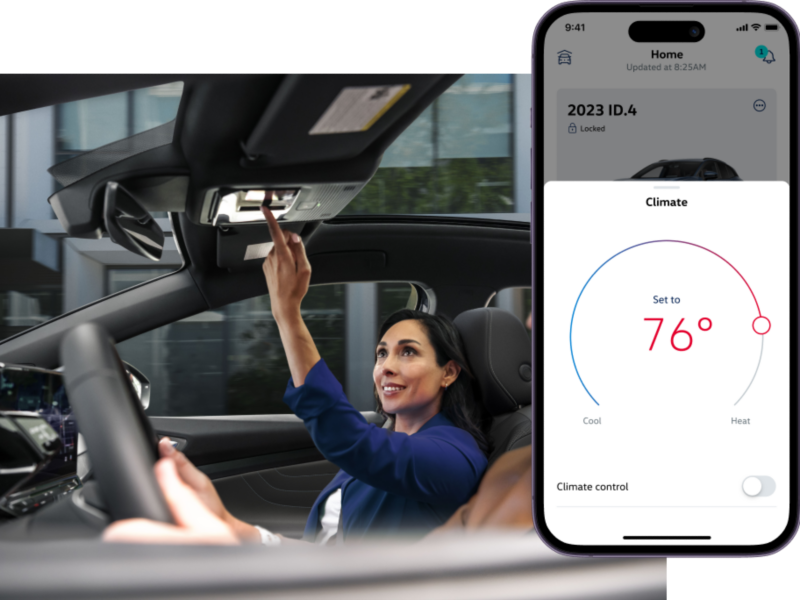 Interior vehicle shot of the front passenger interacting with the overhead controls. The myVW app is displayed on a superimposed mobile phone.