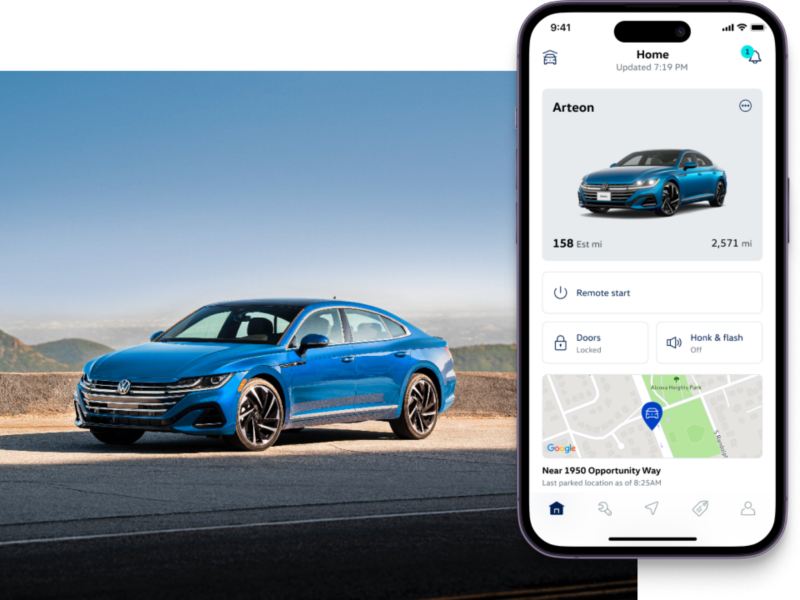 Arteon shown in Kingfisher Blue Metallic parked in a desert setting. To the right, the MyVW app interface is displayed on a compatible phone.