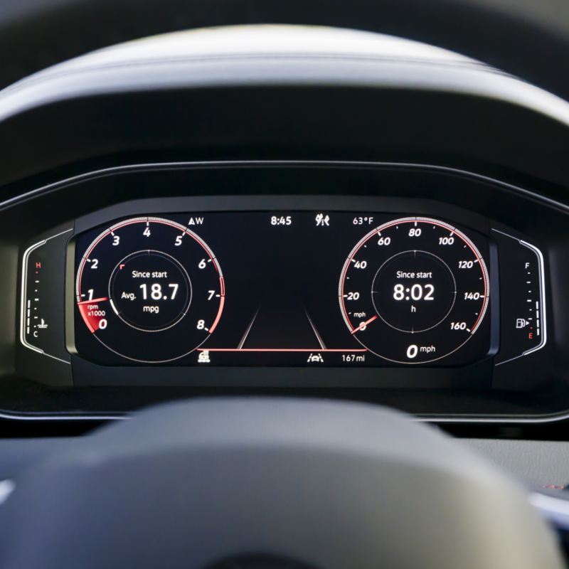 Close-up of the 2025 VW Jetta GLI's digital cockpit, highlighting the vehicle's dashboard and controls.