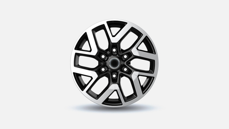 Lichtmetalen velg voor Volkswagen Transporter met een tweekleurig design van zwart en gepolijst zilver.