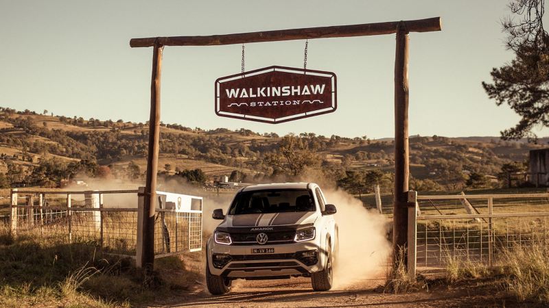 Volkswagen Amarok W-Series leaving paddock underneath Walkinshaw Station gate.