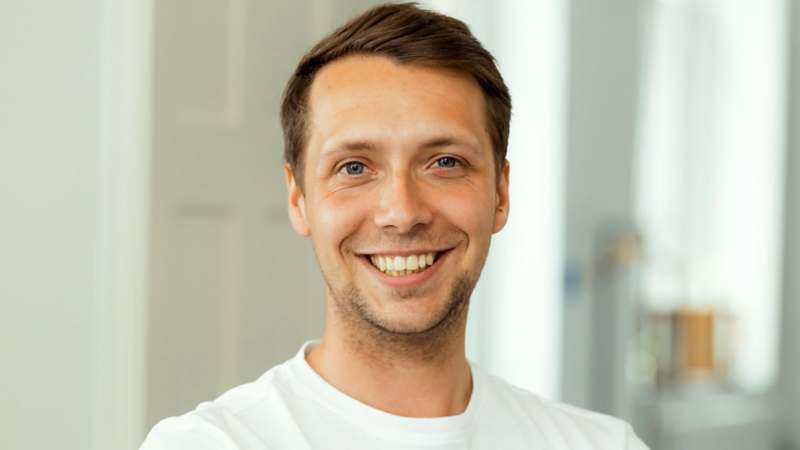 Niklas, developer at Volkswagen's  SID Hanover, smiling 