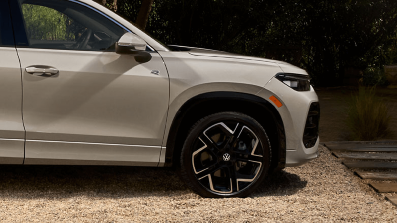 Close-up of the 2026 Volkswagen Tiguan SUV wheel with black and silver alloy rim.