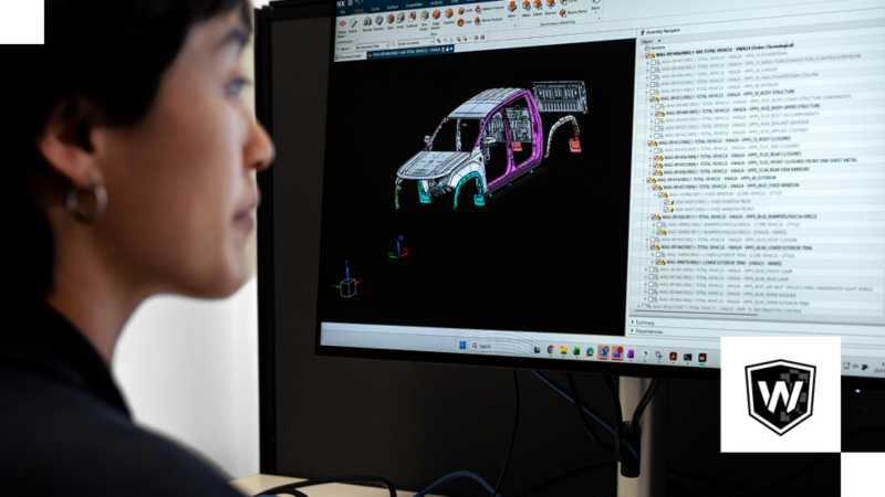 Woman looking at designs for the new Amarok Walkinshaw