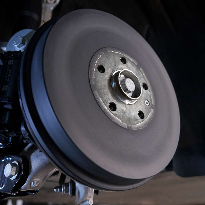 Bare car wheel in the mechanics 