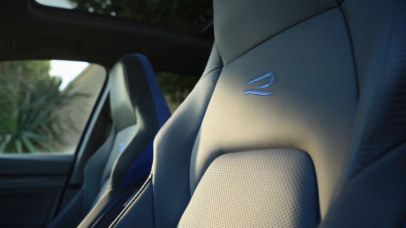 Close-up of top sport seat with “R”-logo on the backrest