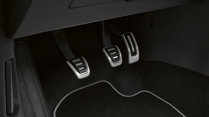 Detailed view of the footwell of a car with a stylish pedal pad set – Volkswagen Accessories