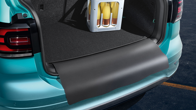 Beverage crate on a reversible luggage compartment mat by Volkswagen Accessories