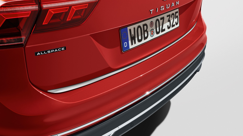 Red VW Tiguan Allspace, protective strip for the tailgate by VW Accessories in focus