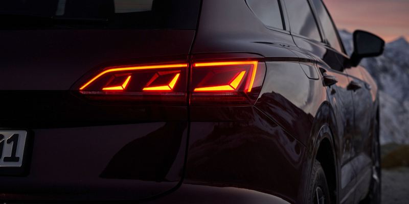 The LED tail light clusters of a VW car 