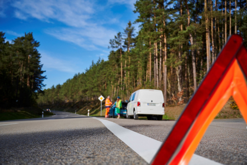 Volkswagen van parked on the side of roadworks