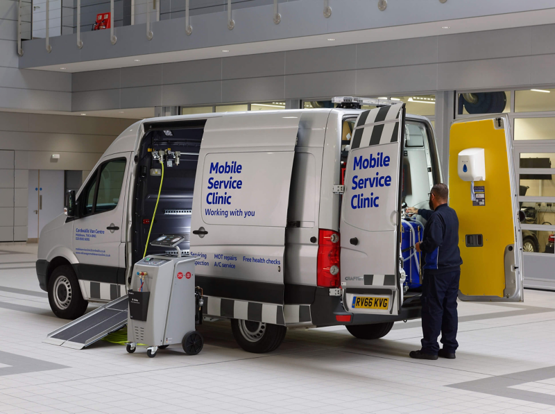 Mobile Servicing van in garage with mechanic