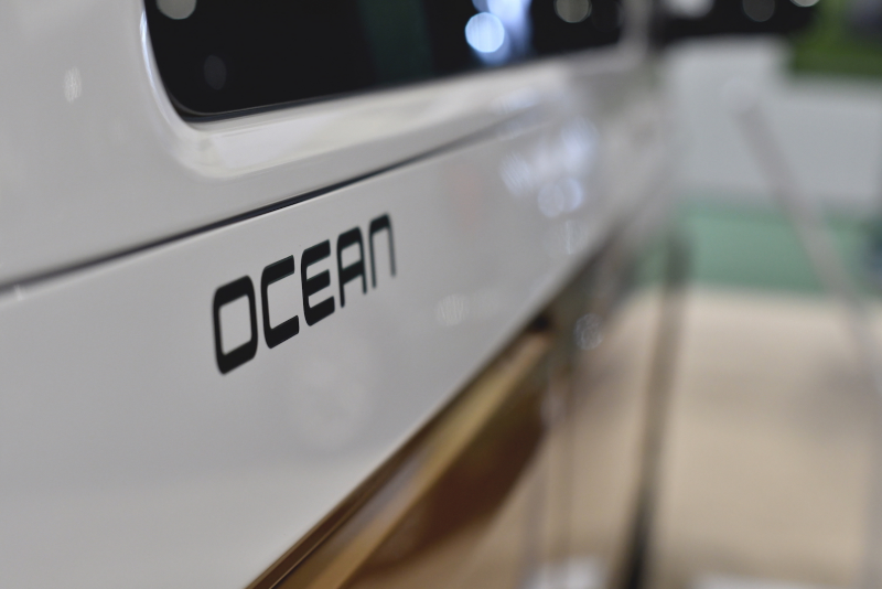 Close up photo of the 'ocean' badge on a VW California Ocean. 