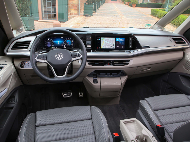 Interior photo of the cockpit area in a VW van.