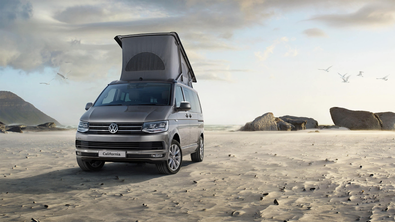 California van rooftop tent on the beach