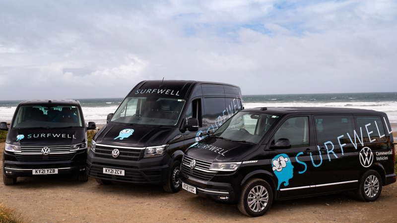 Three Surfwell branded VW vans. 