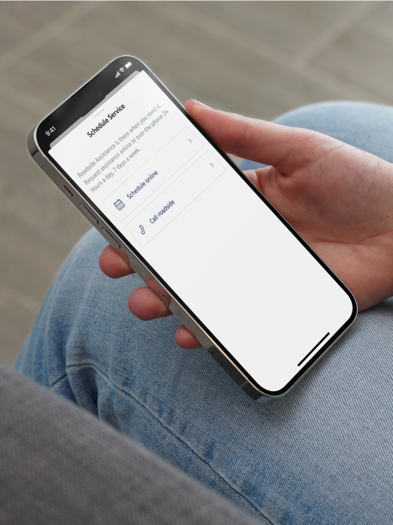 myVW mobile app screen with roadside assistance option.