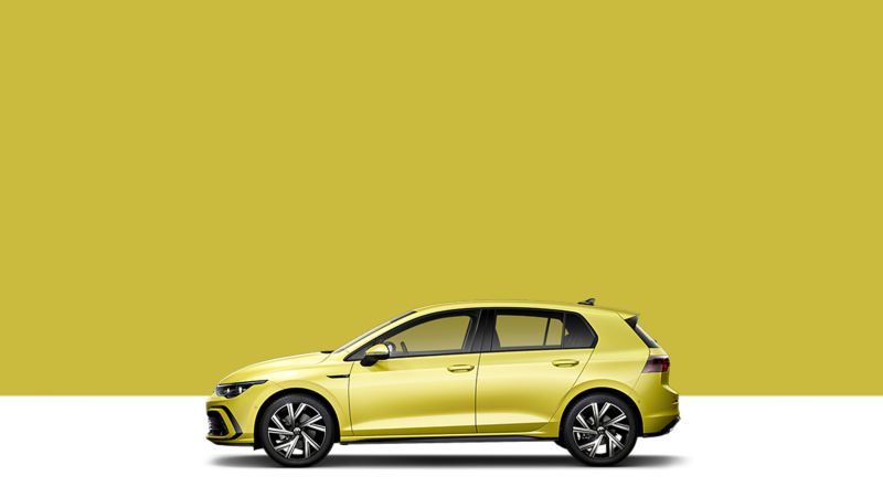Side view of a Volkswagen Golf on a yellow background