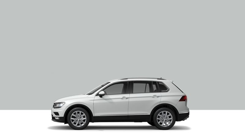 Side view of a VW Tiguan on a grey background