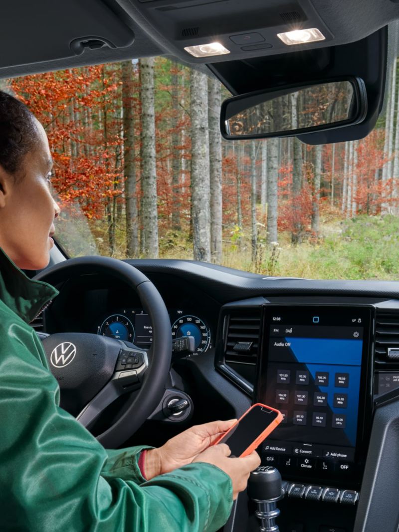 A woman behind the wheel of the VW Amarok.
