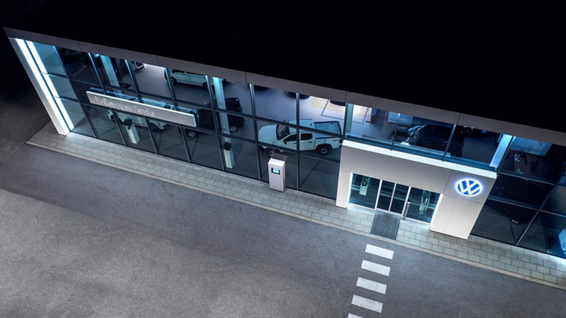 Photo of a VW Van Centre at night. 