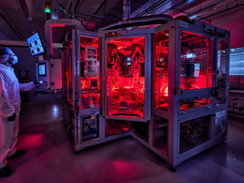 red-lit factory electrical room