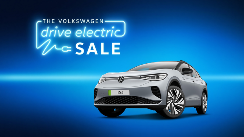 Drive Electric sale logo in neon style font with 3/4 view of the VW ID.4