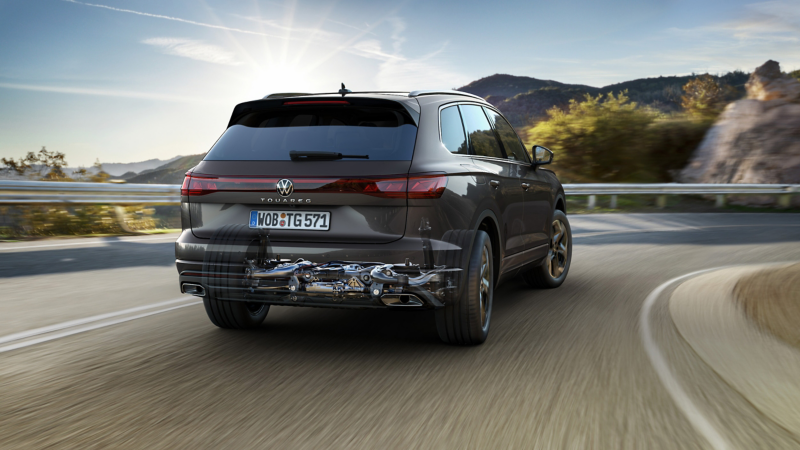 A rear view of a VW car driving along the motorway
