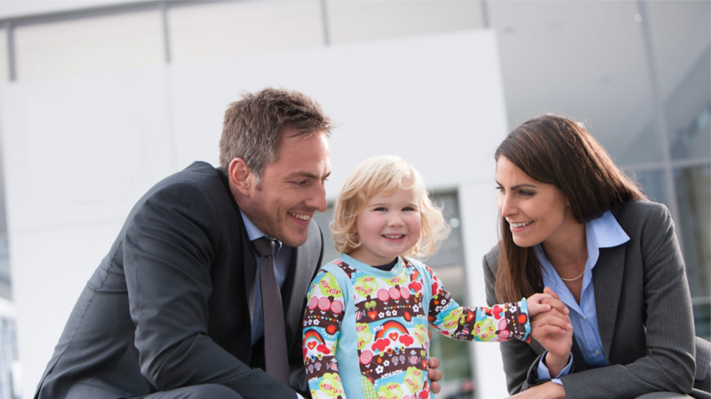 Happy family outside VW Van Centre