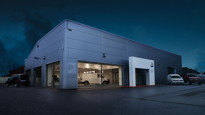 Photo showing a Volkswagen Van Centre at night.