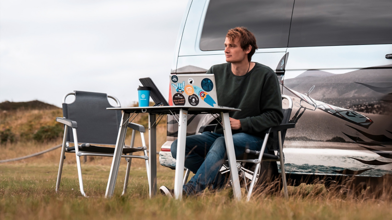 Listening to music while you’re camping.