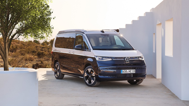 VW California parked next to a building.