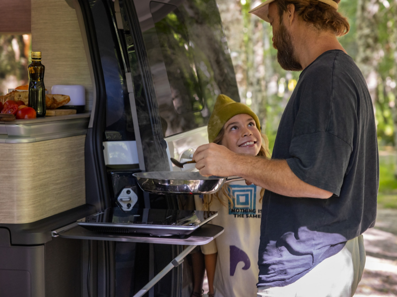 Cooking in the kitchen of the VW California.