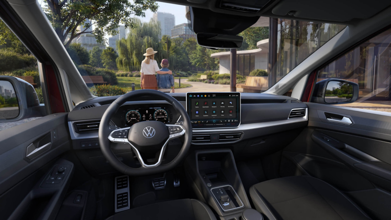 view of the cockpit with steering wheel and infotainment system in the new VW Caddy
