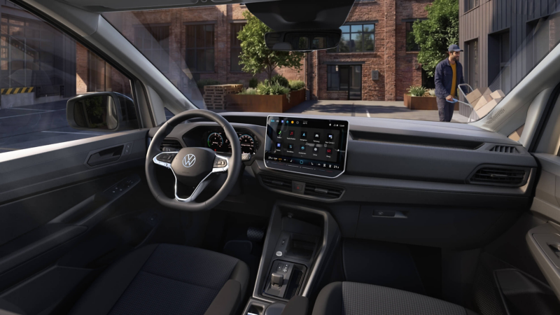 interior of the Caddy Cargo showing the front seats and steering wheel